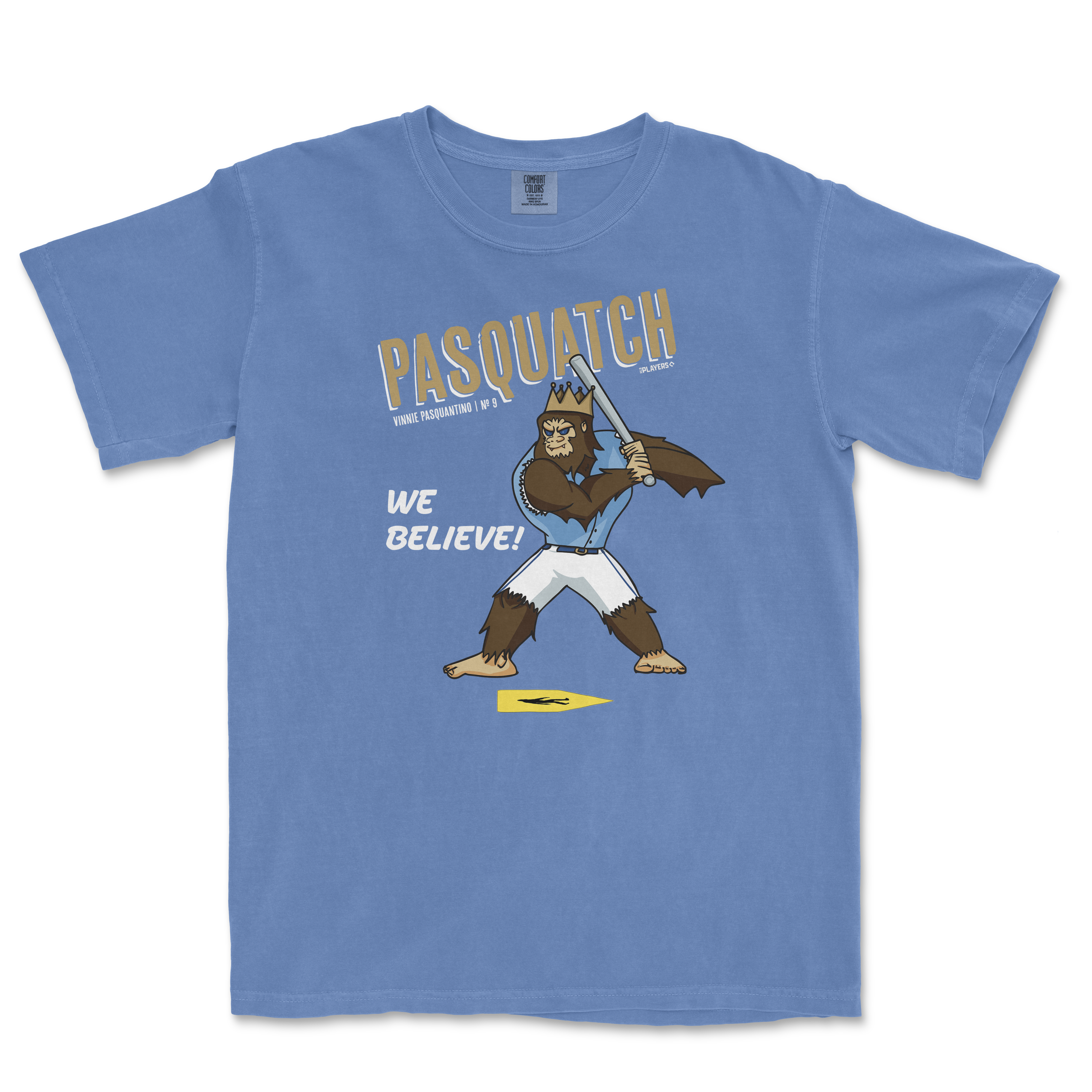Light blue t-shirt featuring a cartoon Sasquatch wielding a baseball bat with the text "Pasquatch We Believe" above.