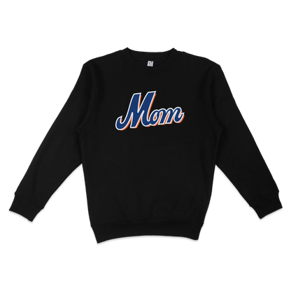 Black crewneck sweatshirt with "Mom" in bold, colorful script lettering, perfect for Queens baseball moms.