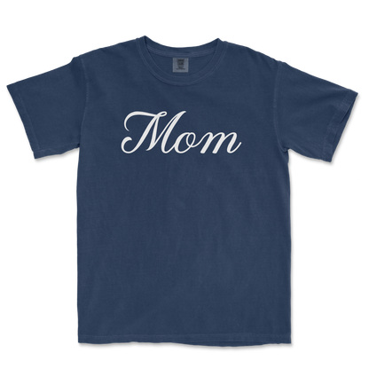 Comfort Colors blue T-shirt with white "Mom" text in elegant script, celebrating a Bronx baseball mom.