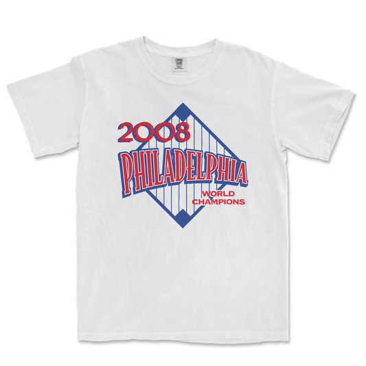 White T-shirt featuring a vintage-style graphic celebrating the 2008 Philadelphia World Champions with red and blue text and a bridge illustration.