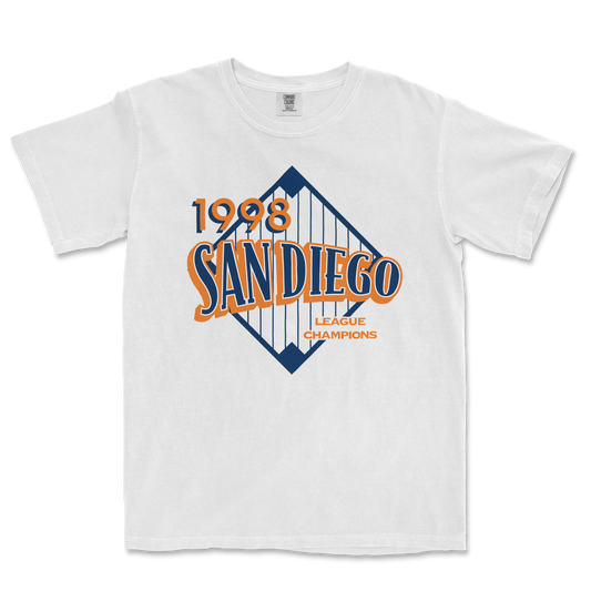 White T-shirt featuring a vintage San Diego 1998 league champions design with a stylized bridge graphic in blue and orange.