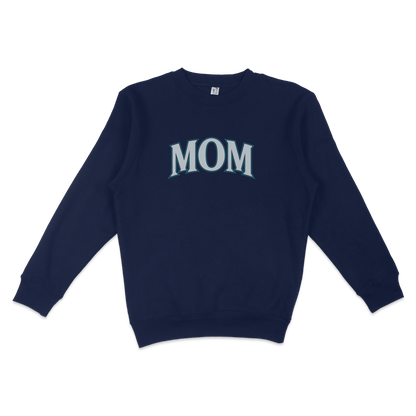 Navy blue crewneck sweatshirt with "MOM" printed in large, bold, light blue letters on the front, designed for Seattle baseball moms.