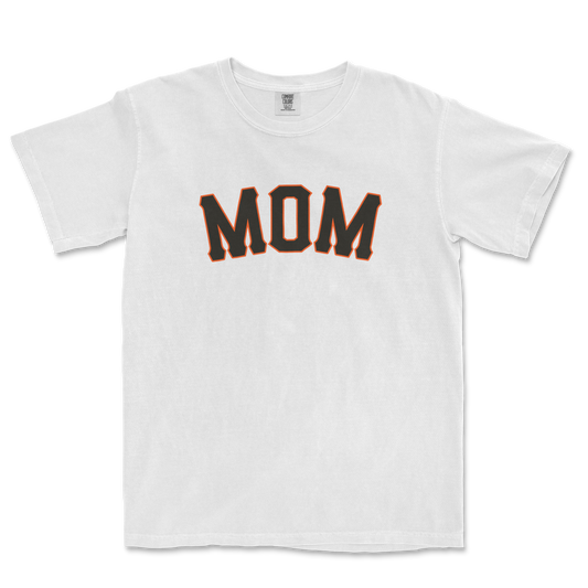 White T-shirt with "MOM" printed in bold black letters outlined in orange, designed for San Francisco baseball moms.