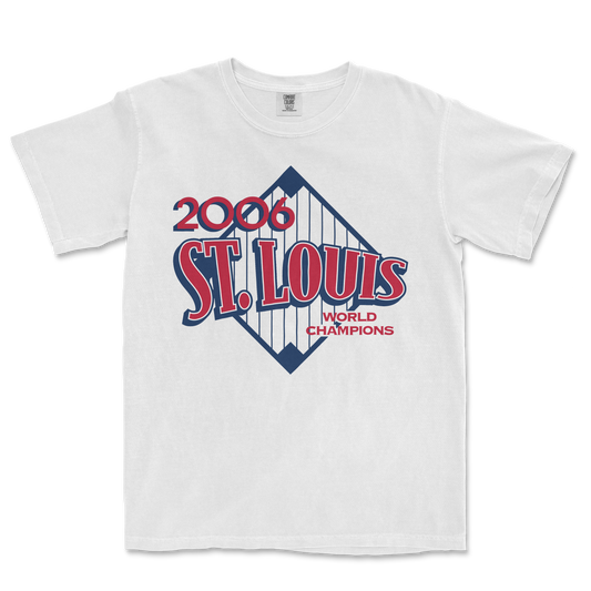 White T-shirt featuring a vintage design celebrating the 2006 St. Louis Cardinals as World Champions, with bold red and blue graphics.