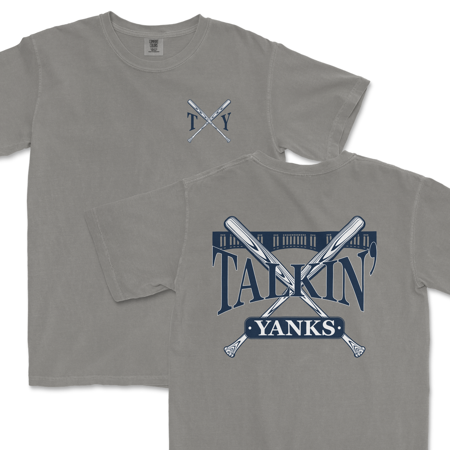 Gray Comfort Colors t-shirt featuring a 'Talkin’ Yanks' graphic with crossed baseball bats and a stylized fence design, with a small logo on the front left chest and a larger version on the back.