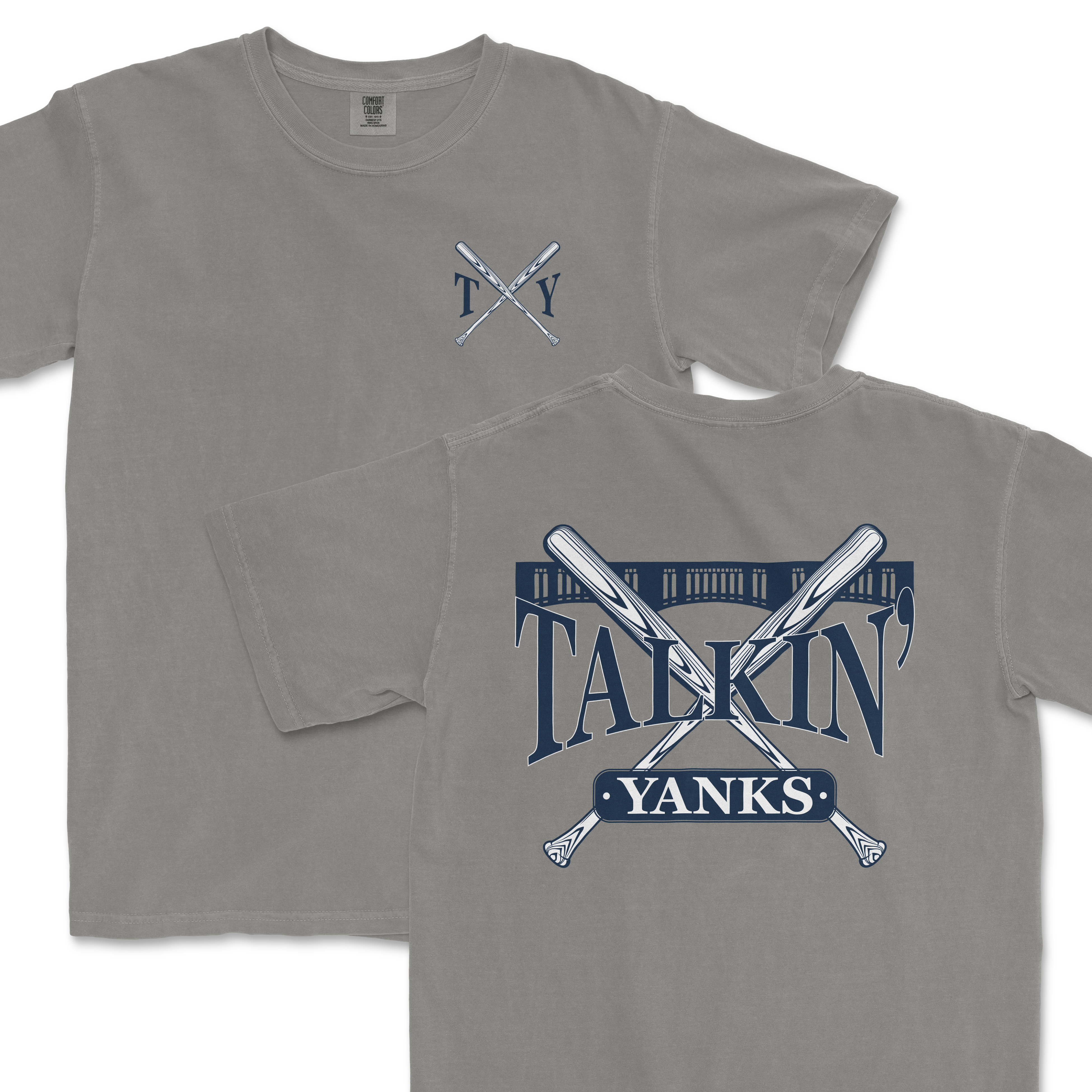 Gray Comfort Colors t-shirt featuring a 'Talkin’ Yanks' graphic with crossed baseball bats and a stylized fence design, with a small logo on the front left chest and a larger version on the back.