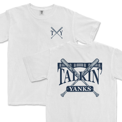 Alt text: Two white Comfort Colors t-shirts featuring the '97 Inspired Talkin' Yanks design; one displayed in full with a large graphic on the back depicting crossed baseball bats, a baseball, and the words "Talkin' Yanks"