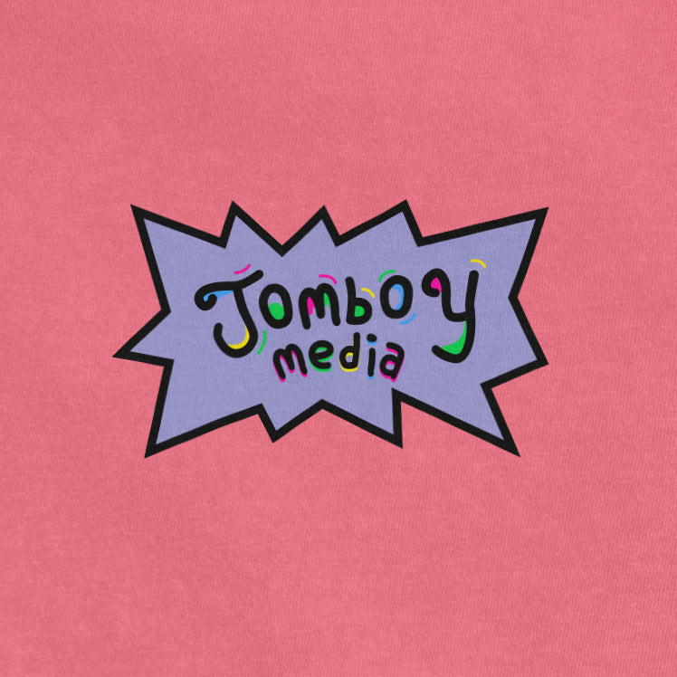 Pink Comfort Colors tee featuring a colorful "Jombo Media" logo inside a comic-style speech bubble.