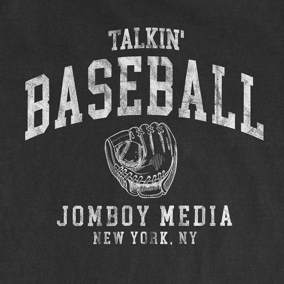 "Black T-shirt with white distressed text and baseball glove graphic, reads 'Talkin' Baseball 90's Edition, Jomboy Media, New York, NY'.