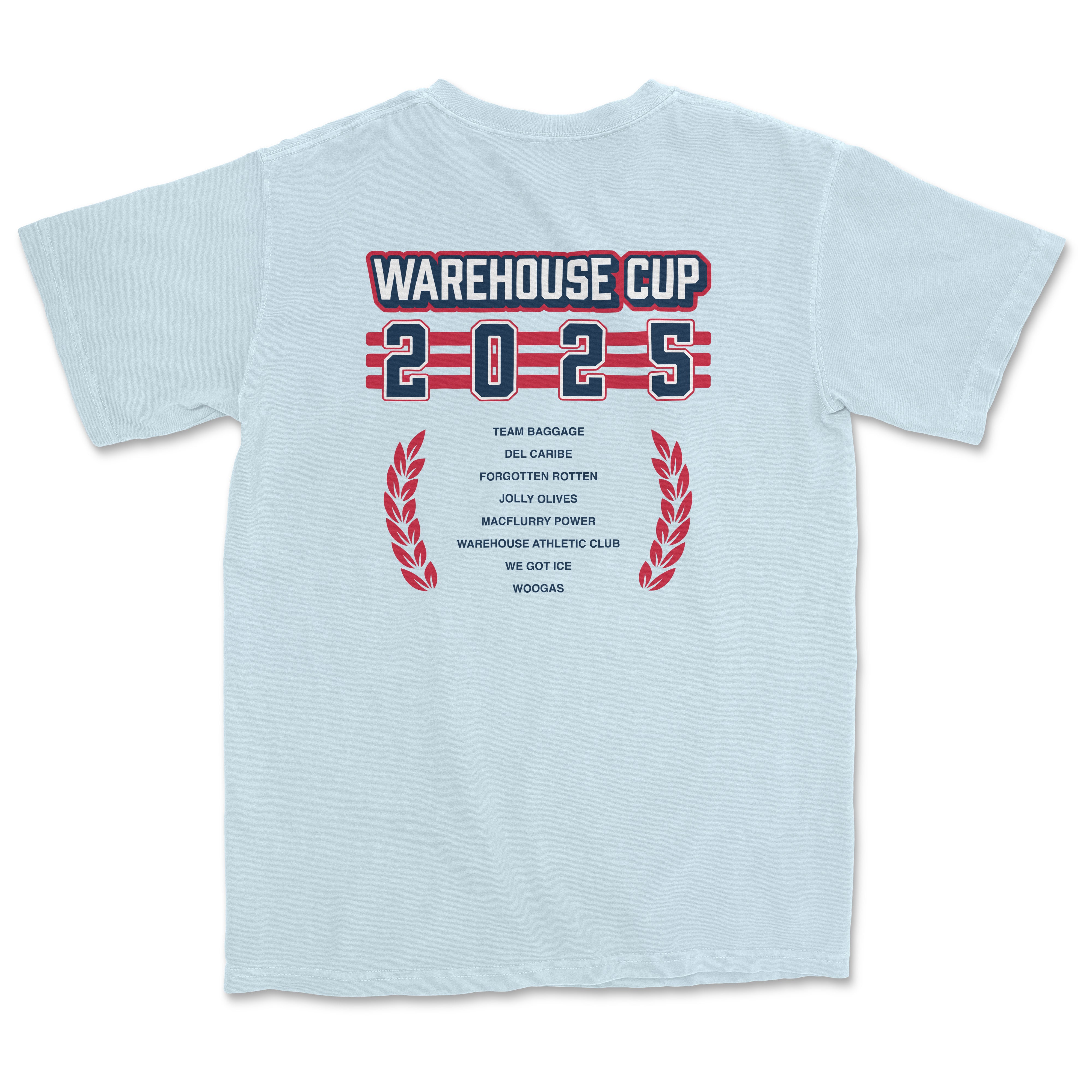 Back of a light blue T-shirt featuring "Warehouse Cup 2025" text, team names, and red laurel wreath graphics.