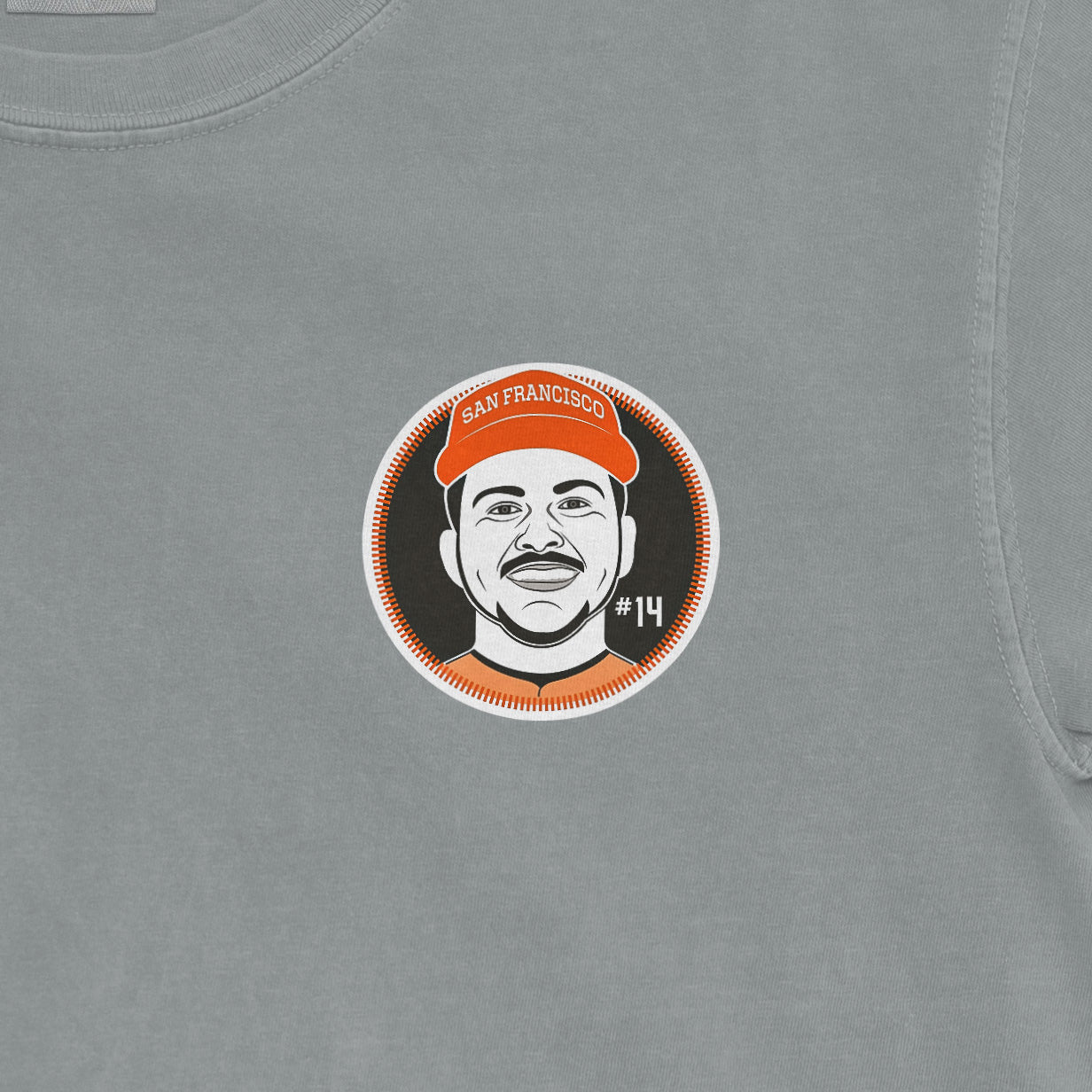 Close-up of a gray Patrick Bailey shirsey featuring a circular graphic with a cartoon portrait, "San Francisco" text, and "#14".