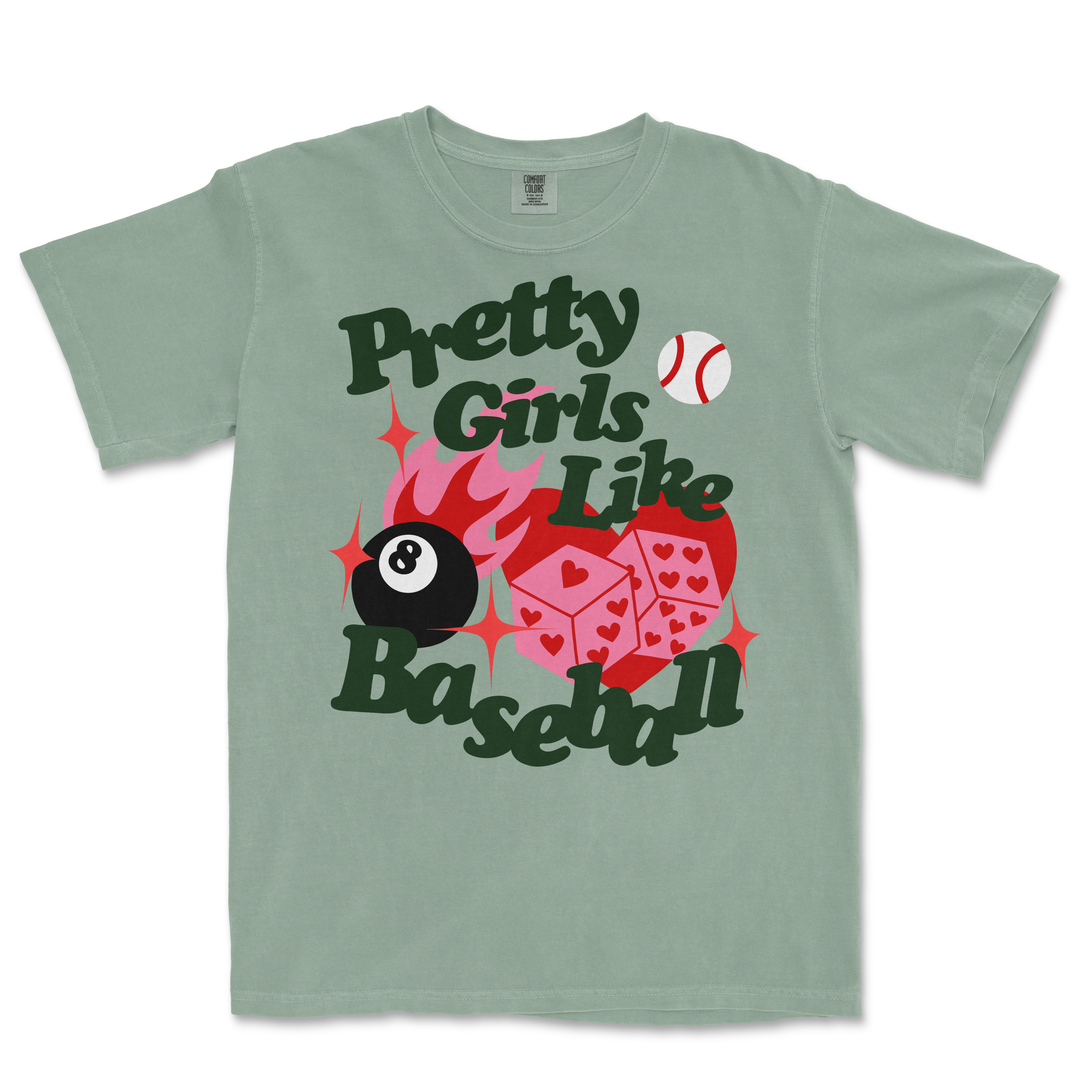 A light green T-shirt with a playful design featuring a flaming heart, dice with hearts, a baseball, and the text "Pretty Girls Like Baseball" in bold, dark green letters.