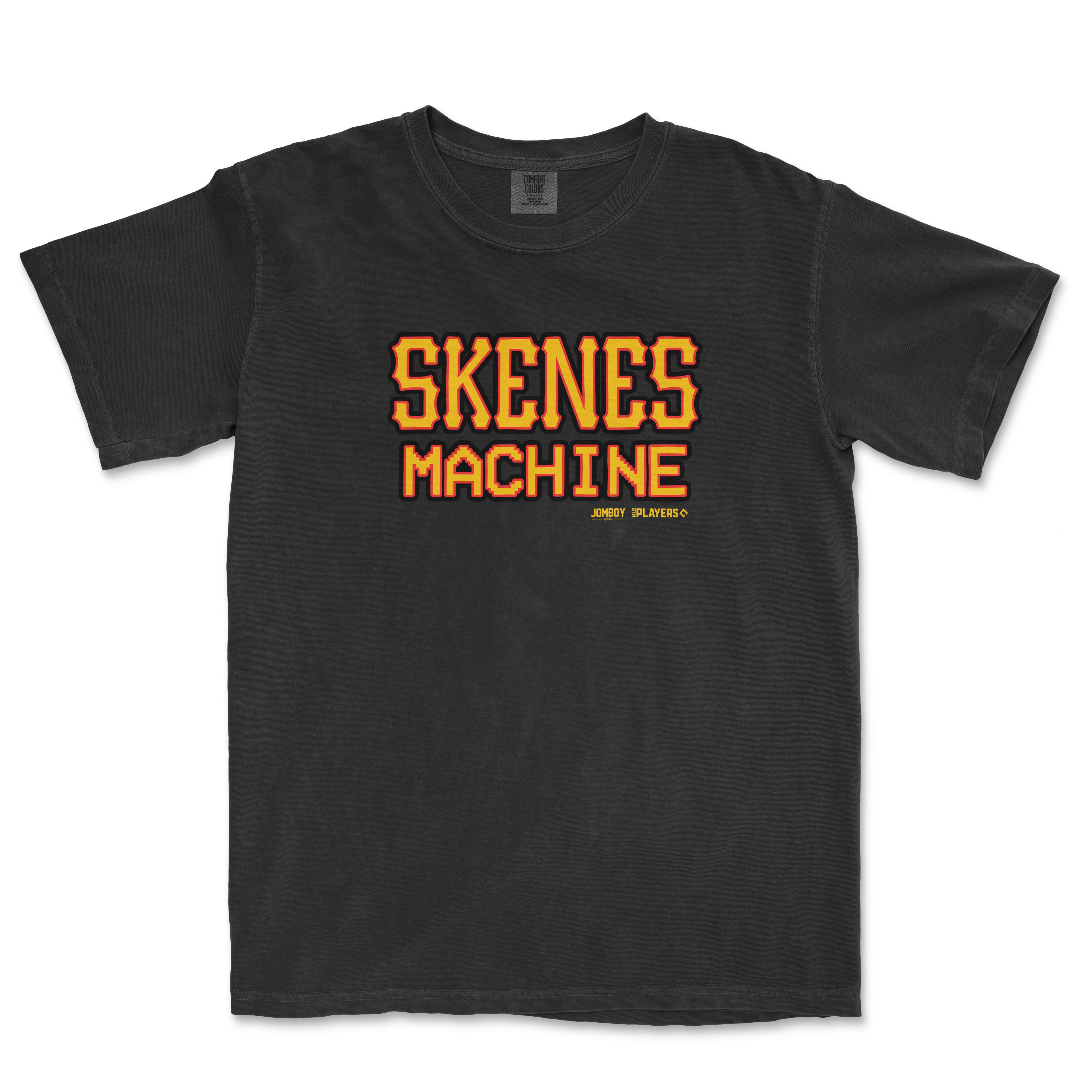 Black T-shirt featuring bold red and yellow "SKENES MACHINE" text with smaller yellow "JOMBOY" and "PLAYERS" branding below.