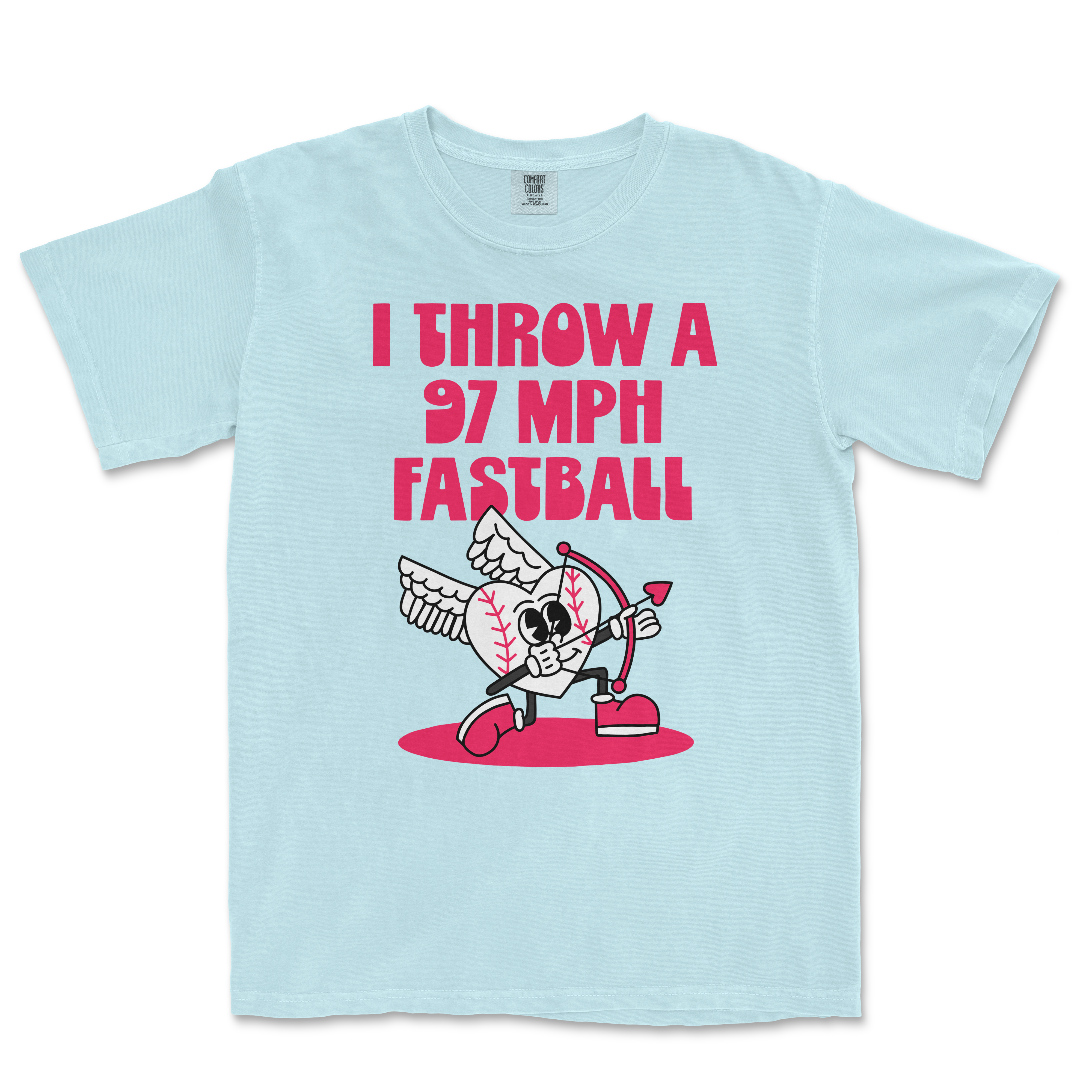 Light blue Comfort Colors T-shirt featuring a cartoon baseball with wings, holding a bow and arrow, with bold pink text: "I THROW A 97 MPH FASTBALL.