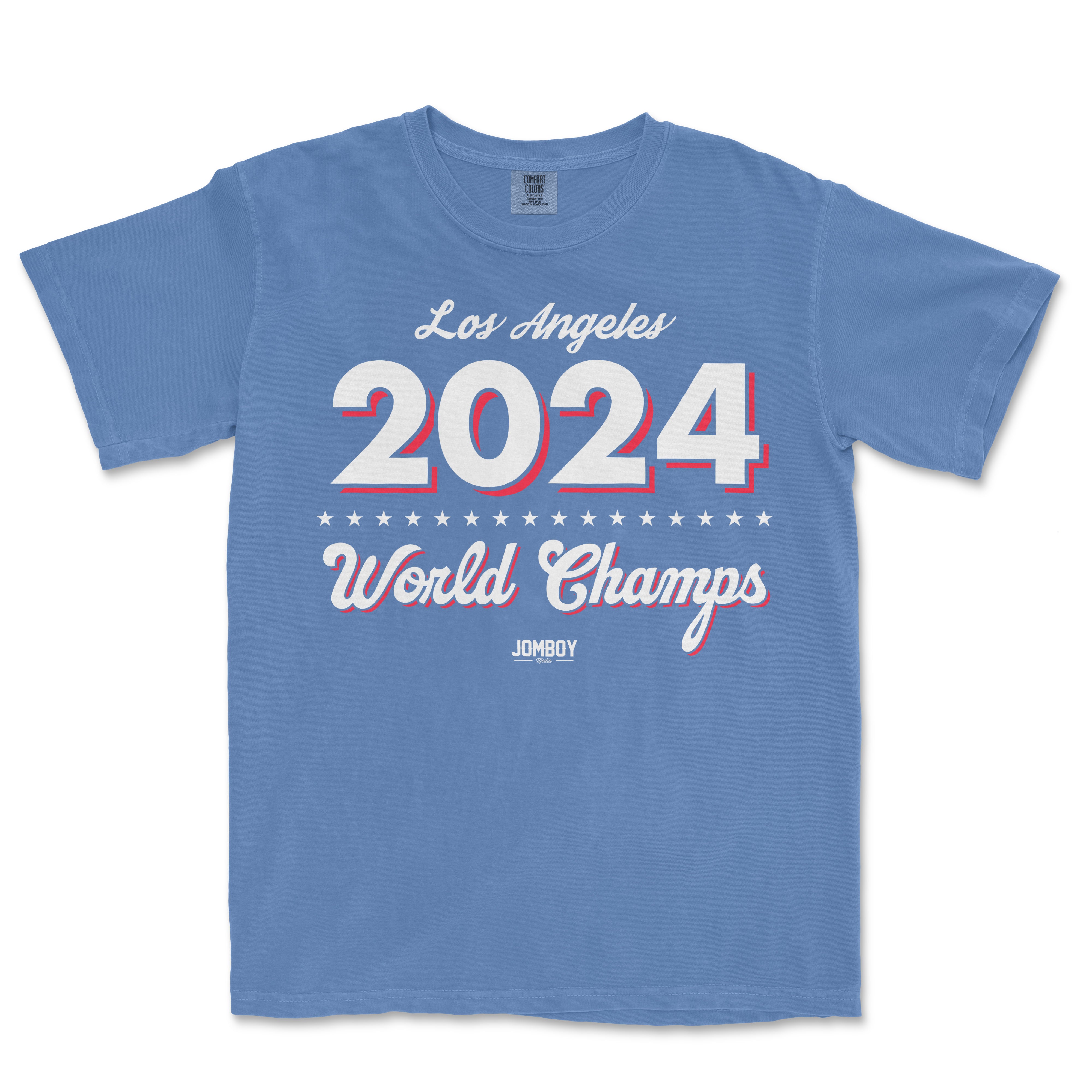 A blue T-shirt with white and red text celebrating the 2024 World Champs in Los Angeles, featuring stars and the brand name JOMBOY.