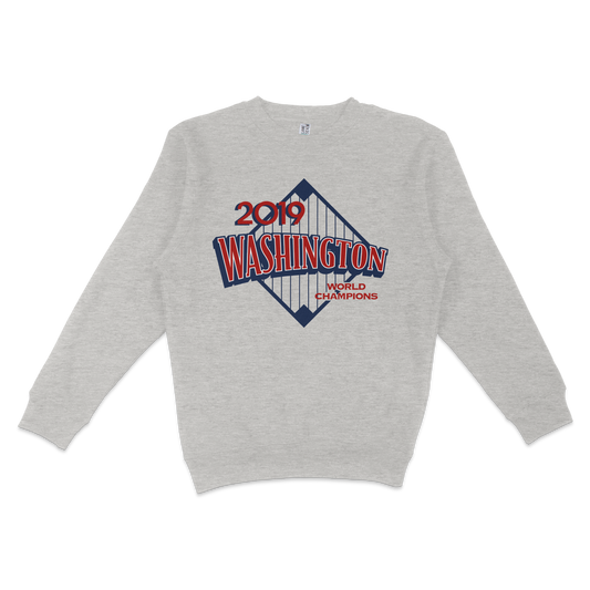 Gray crewneck sweatshirt featuring a 2019 Washington World Champions graphic with a bridge design and bold red and blue text.
