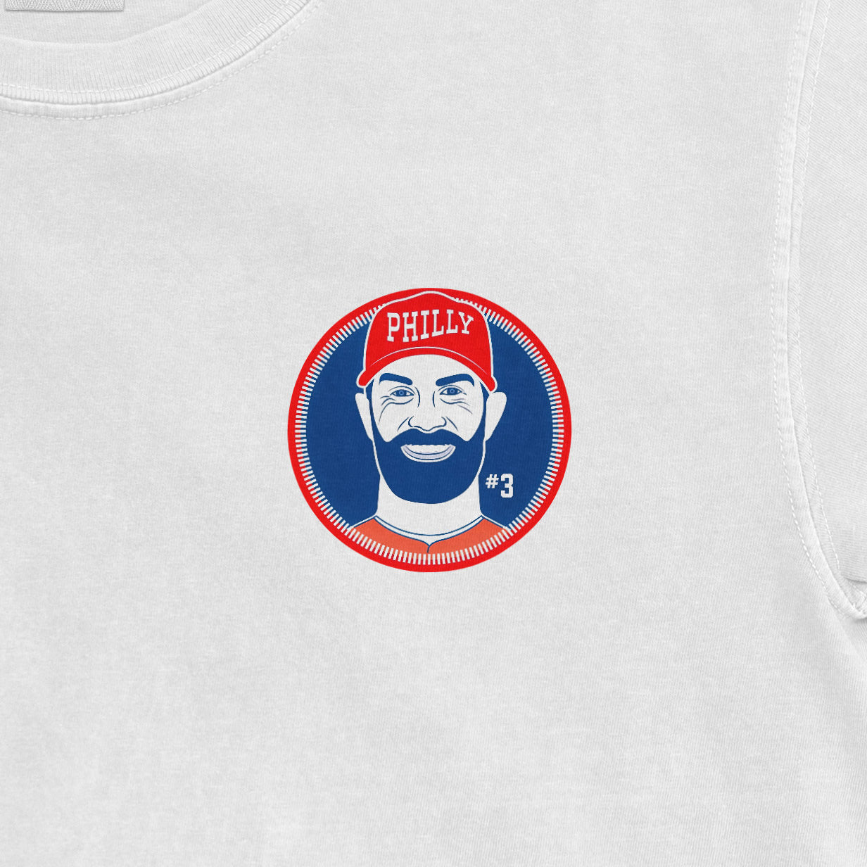 Bryce Harper Phillies shirsey graphic on a Comfort Colors tee, featuring a stylized portrait with "#3" and "PHILLY" on a red cap.
