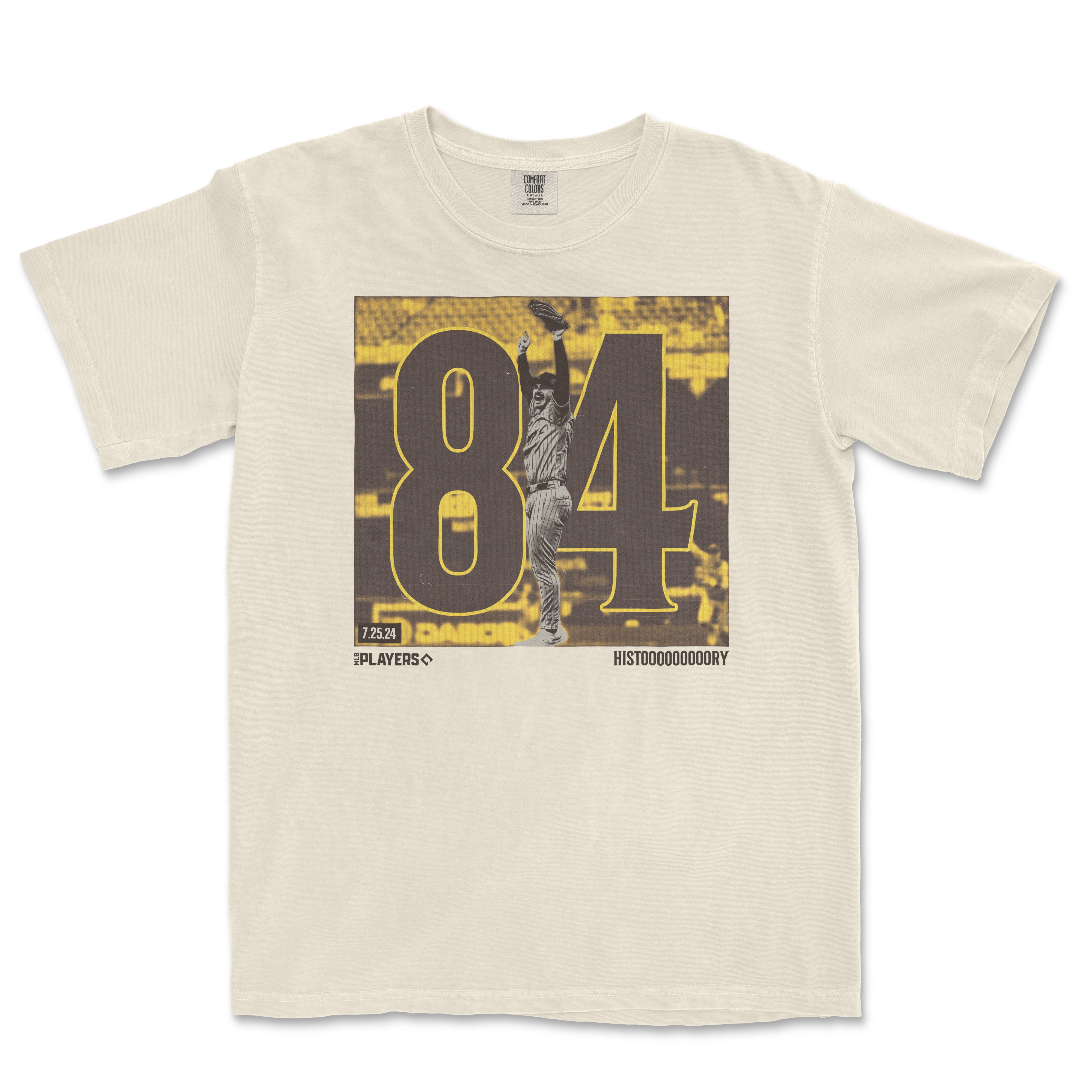 Comfort Colors beige T-shirt featuring a vintage-style baseball graphic with large black and yellow "84" numbers and a player in action.