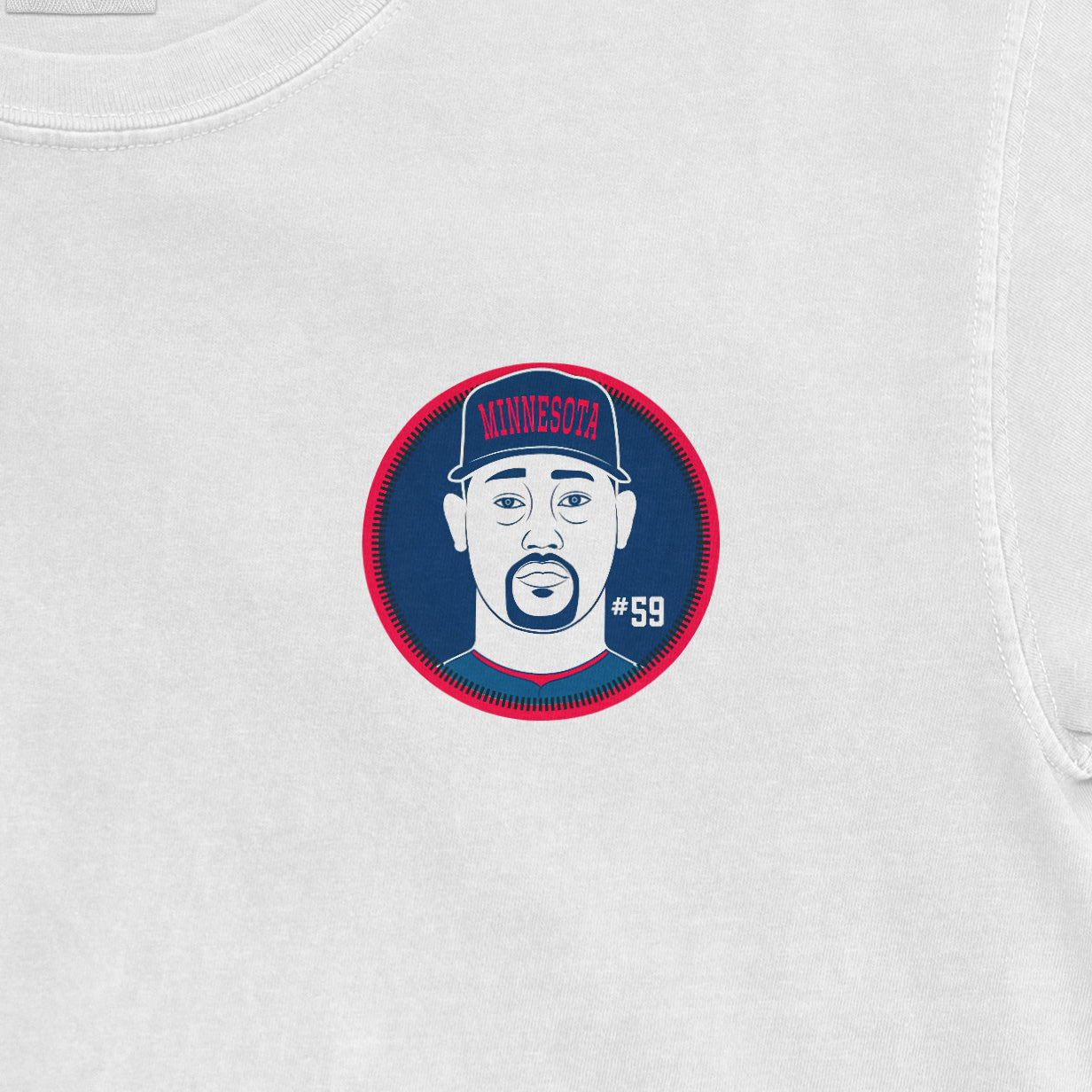 Close-up of a Comfort Colors tee featuring a graphic of Jhoan Duran with "Minnesota" and "#59" on a circular patch.