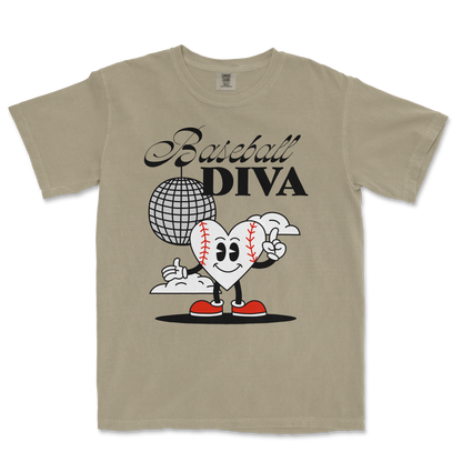 Beige Comfort Colors tee featuring a cartoon heart with baseball stitches, red shoes, and a finger gun, with "Baseball Diva" text.