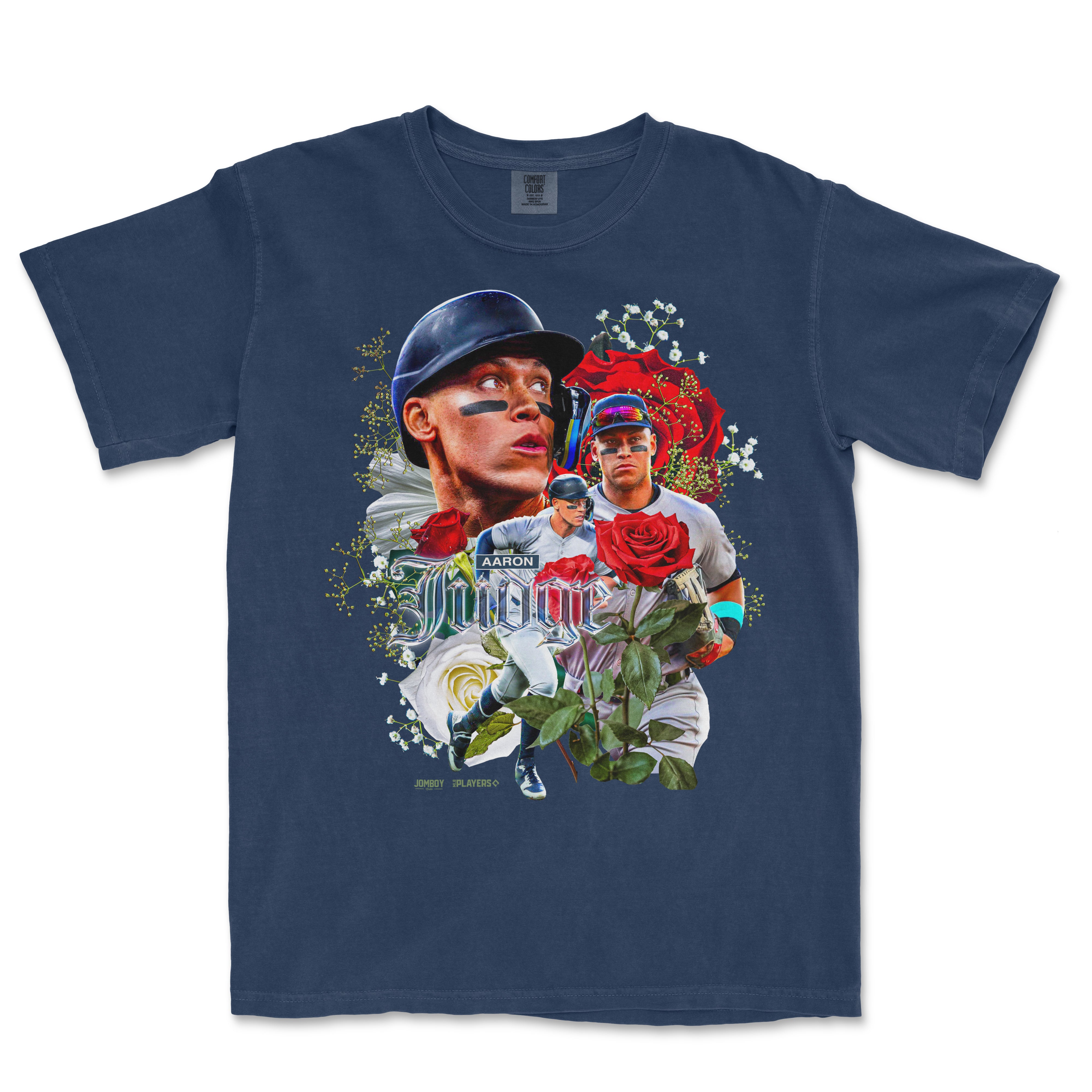 A navy T-shirt featuring a collage of baseball players, roses, and floral elements with the phrase "Smell the Roses" at the top.