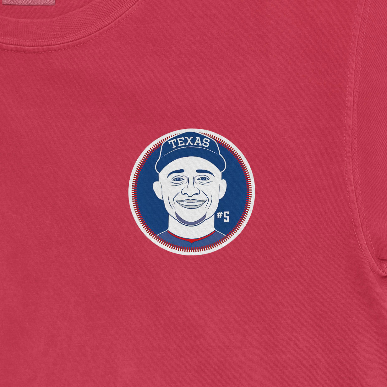 Red Comfort Colors tee featuring a graphic of Corey Seager with "#5" and "TEXAS" on a cap, perfect for baseball fans.