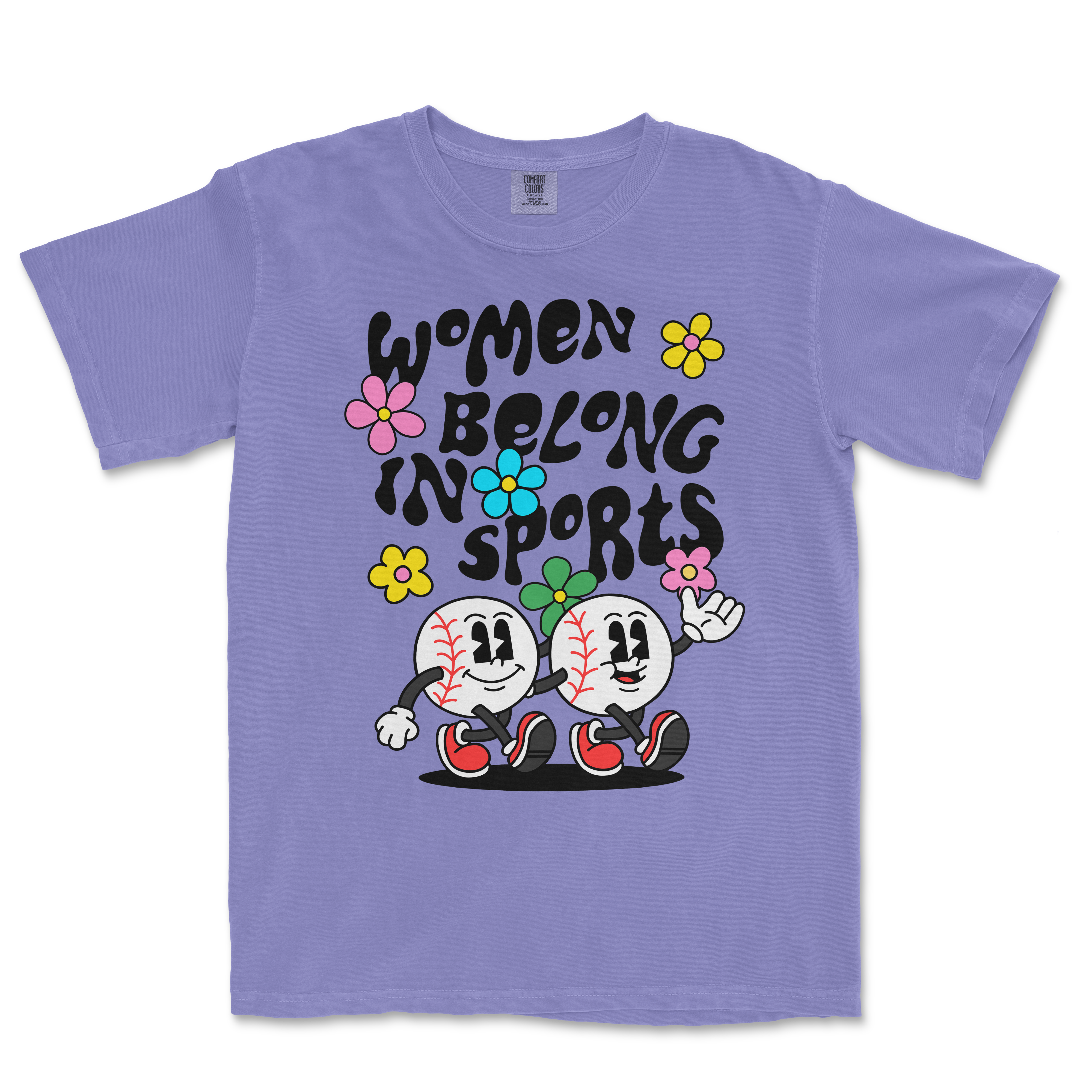 Purple T-shirt featuring cartoon baseballs with smiling faces, colorful flowers, and the text "Women Belong in Sports" in bold black letters.