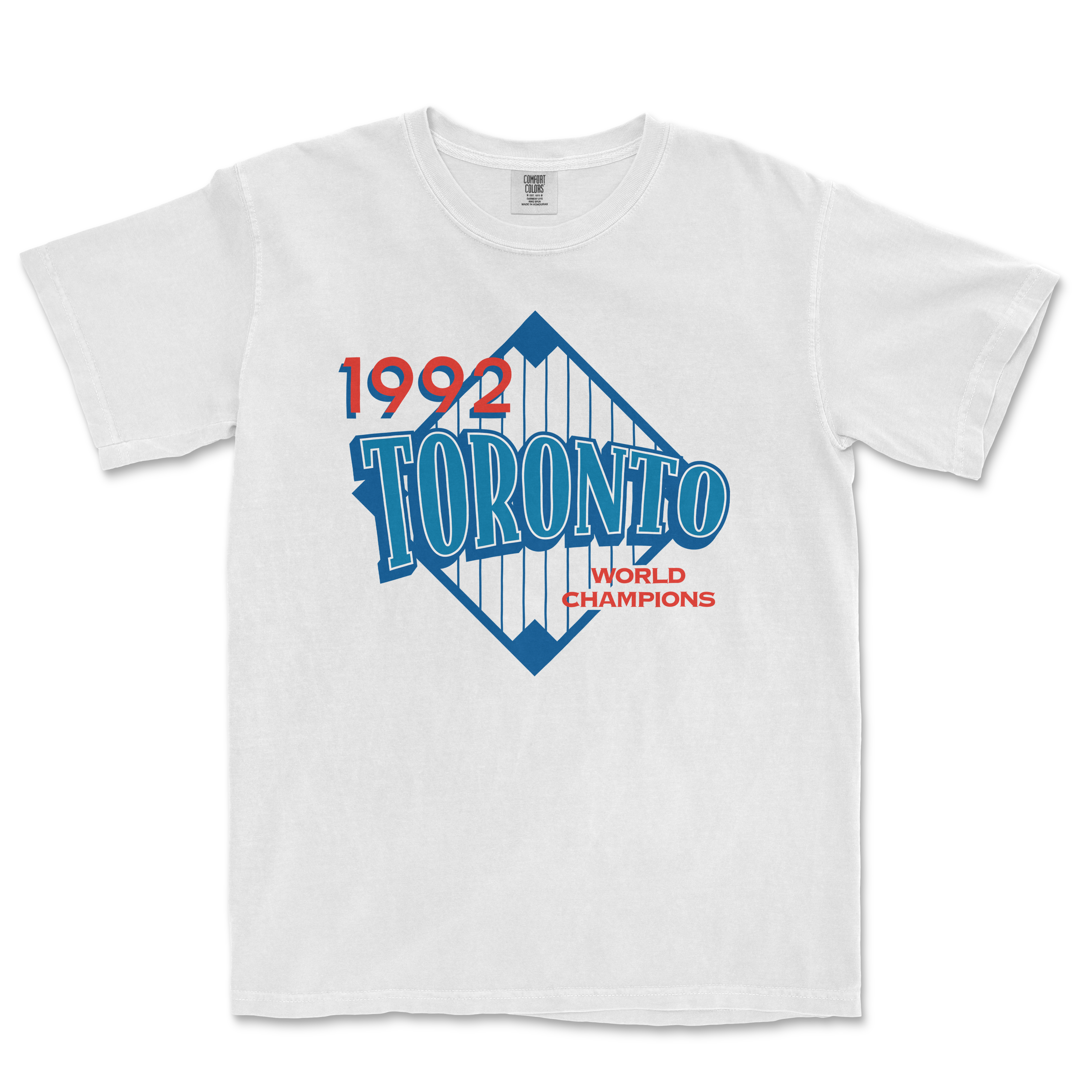 White T-shirt featuring a vintage Toronto 1992 World Champions graphic with blue, red, and white colors and a diamond-shaped design.