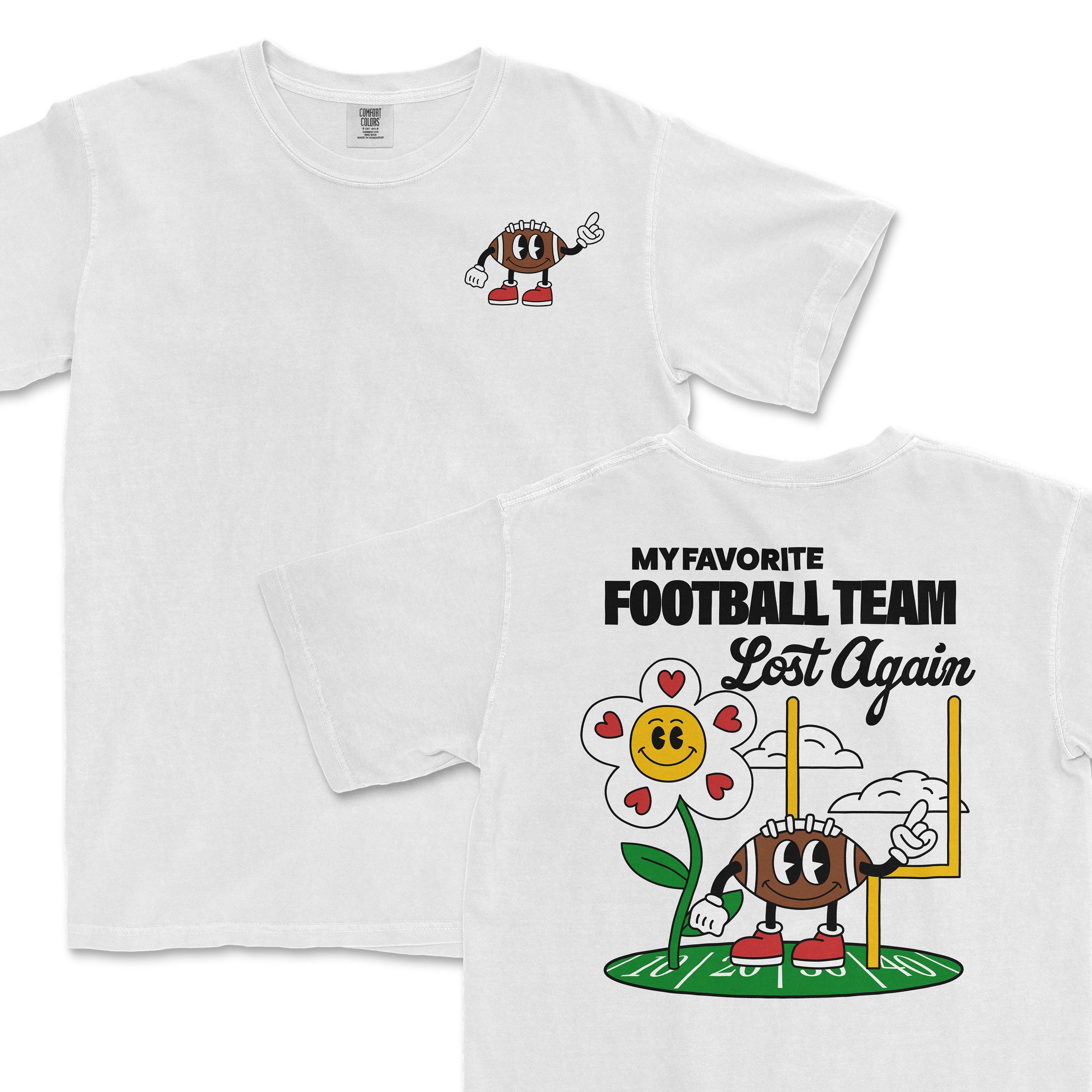 White Comfort Colors T-shirt featuring a cartoon football character with antennas, and the humorous message "My favorite football team lost again" with a smiling flower and football field graphic.