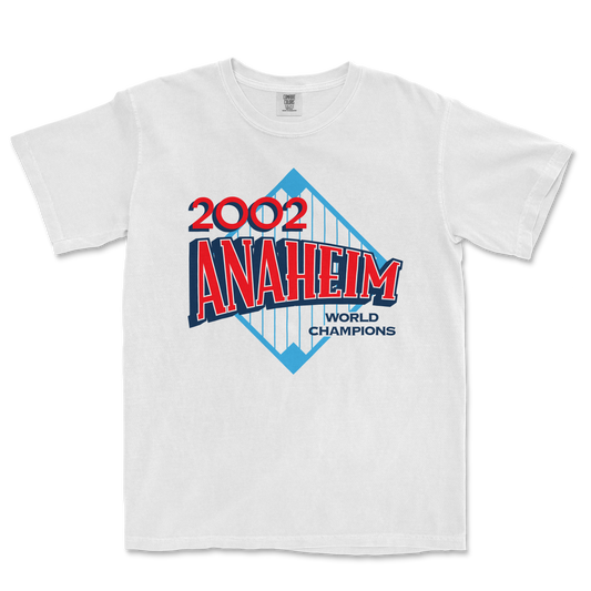 White Comfort Colors tee featuring a 2022 Anaheim World Champions graphic with a blue diamond shape and red, blue, and black text.
