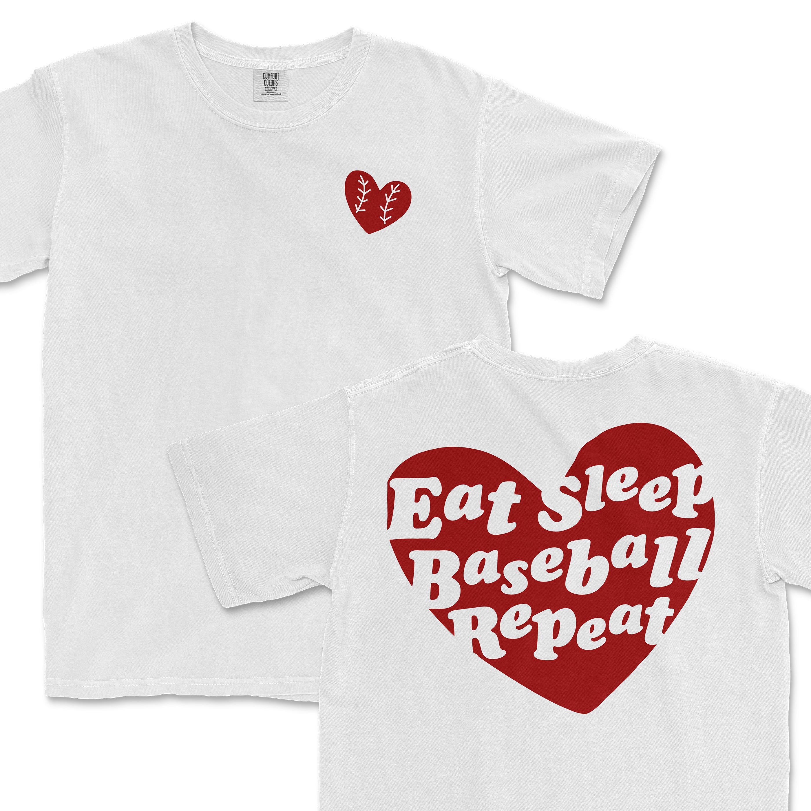 White Comfort Colors T-shirt with a small red heart graphic on the front chest and a large red heart with white "Eat Sleep Baseball Repeat" text on the back.