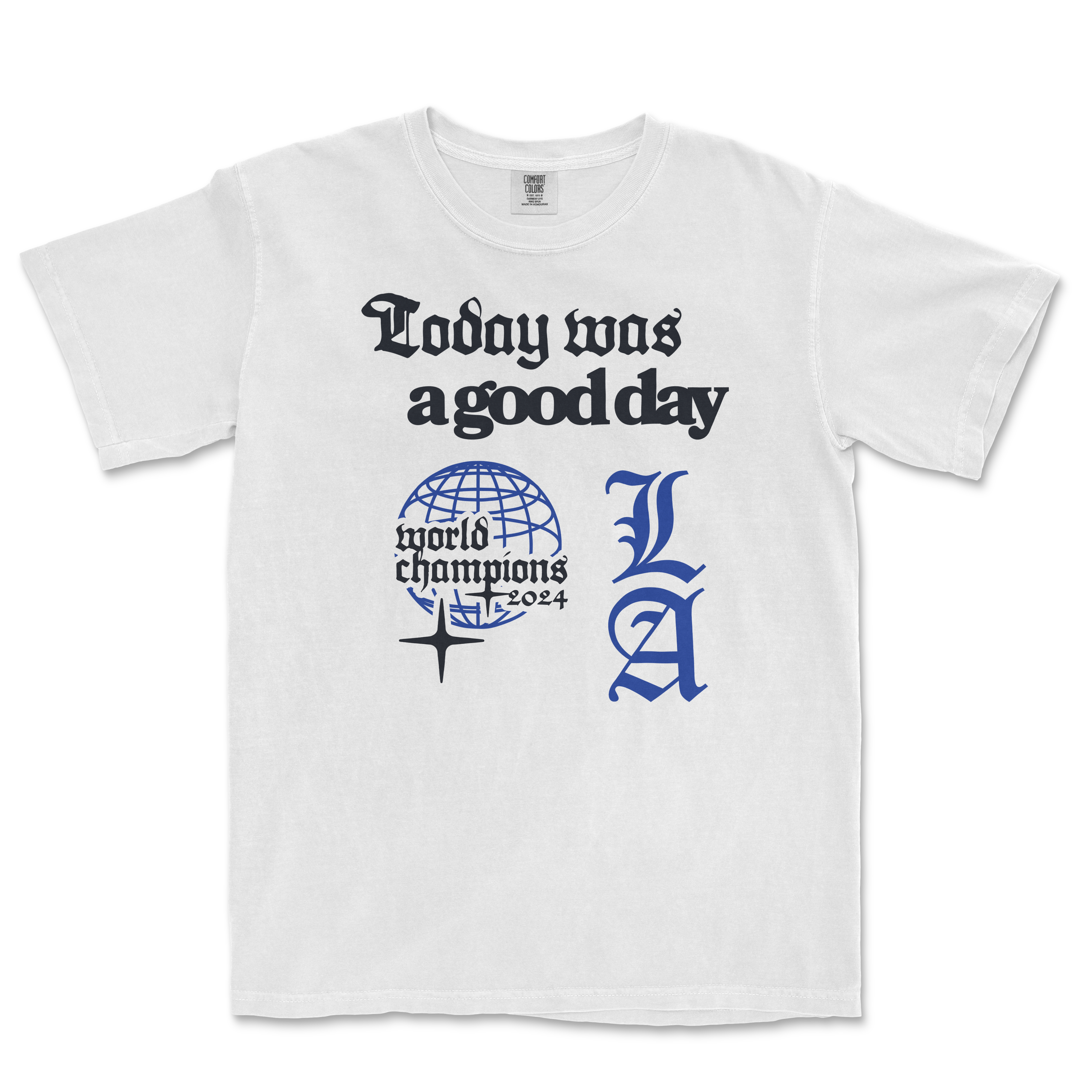 White T-shirt with black and blue text that reads "Today was a good day" and "LA," featuring a globe and "world champions 2024" logo.
