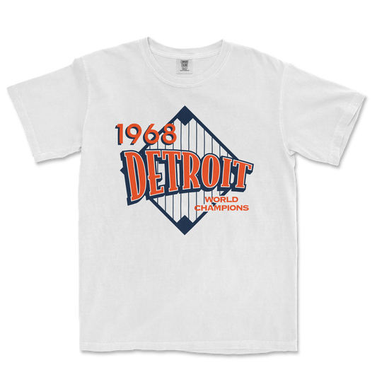 White Comfort Colors tee featuring a vintage Detroit 1968 World Champions graphic with a stylized bridge design.