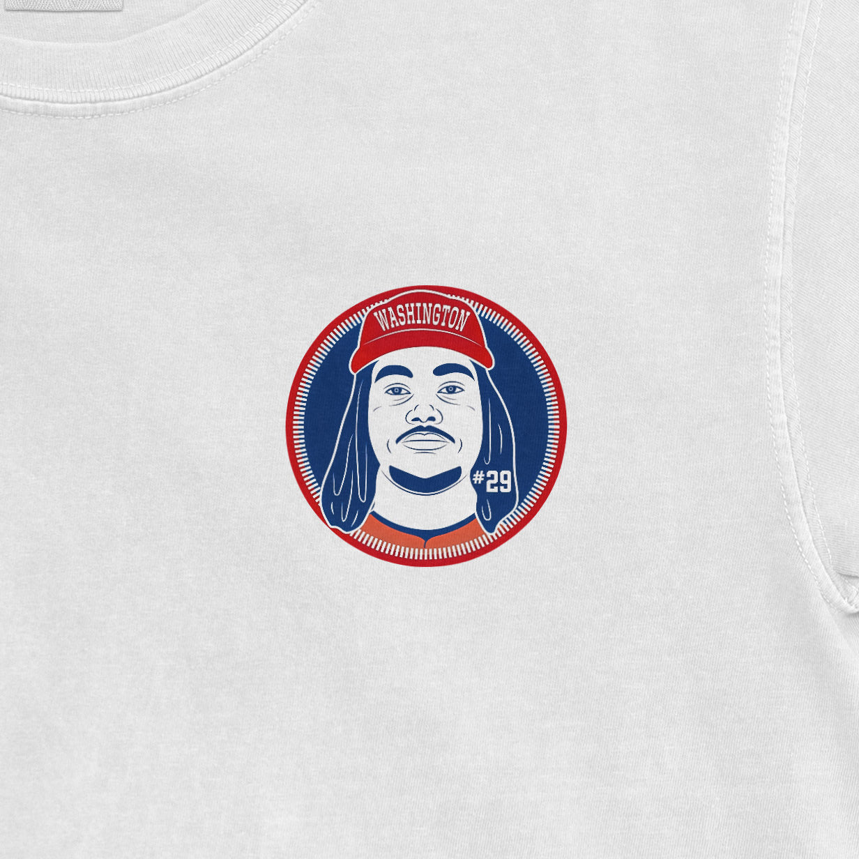White Comfort Colors tee featuring a circular graphic of a person with dreadlocks, wearing a red Washington cap, and "#29" text.