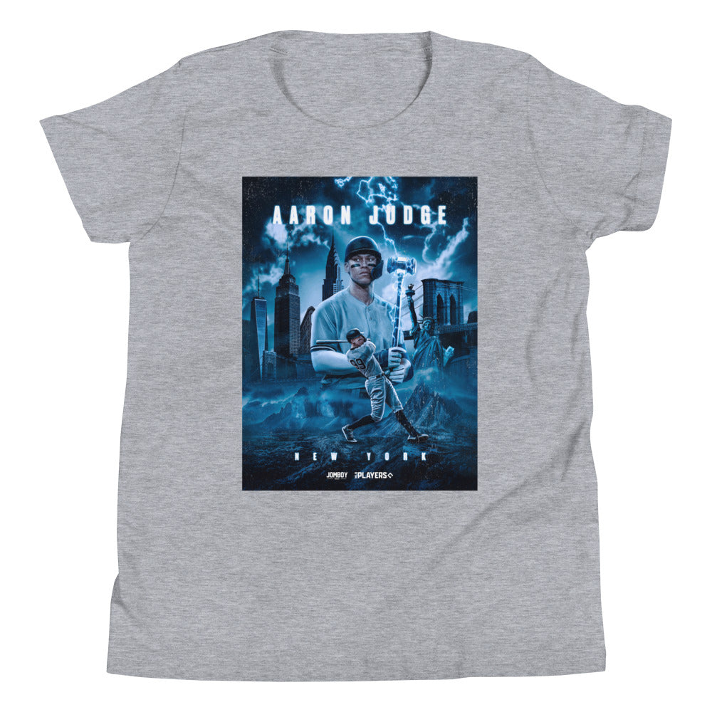 Youth T-shirt featuring Aaron Judge with a graphic of New York City skyline, lightning, and baseball imagery in blue tones.