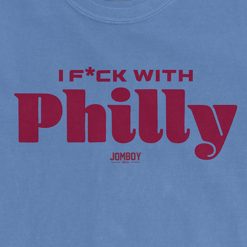 Blue Comfort Colors T-shirt with bold red text that reads "I F*CK WITH Philly" and a small "JOMBOY" logo below.