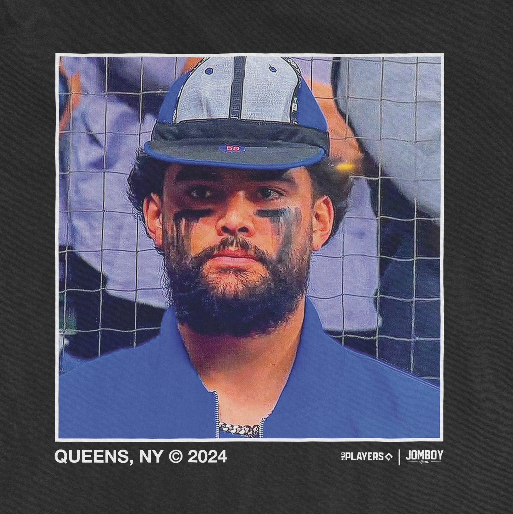 Close-up of a man wearing a baseball cap, with face paint, in front of a net, with text indicating "Sean Manaea Rally Cap," Queens, NY, 2024.