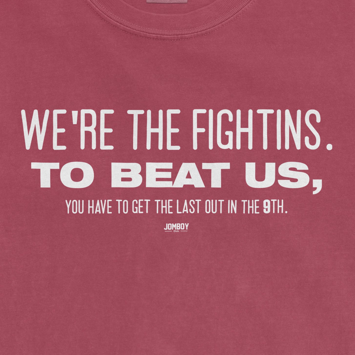 Pink T-shirt with white text: "We're the fightins. To beat us, you have to get the last out in the 9th.